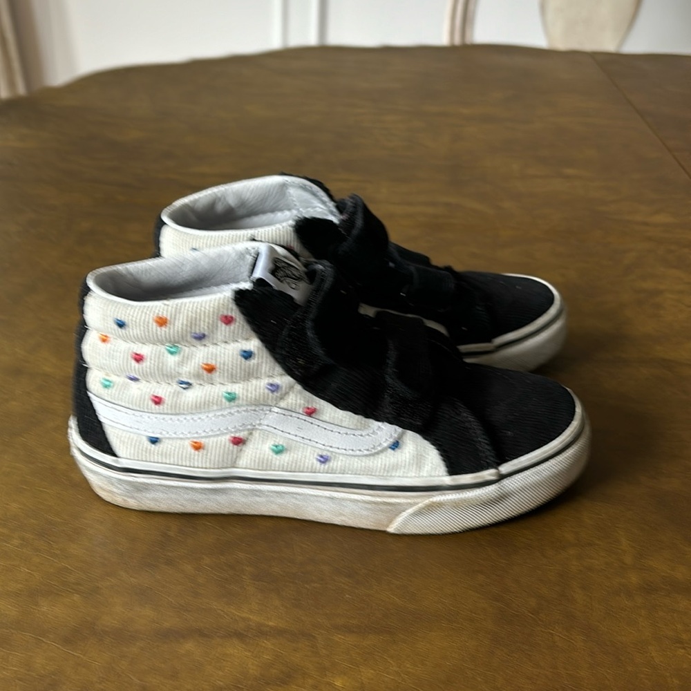 Vans high top black and white corduroy sneaker with rainbow hearts